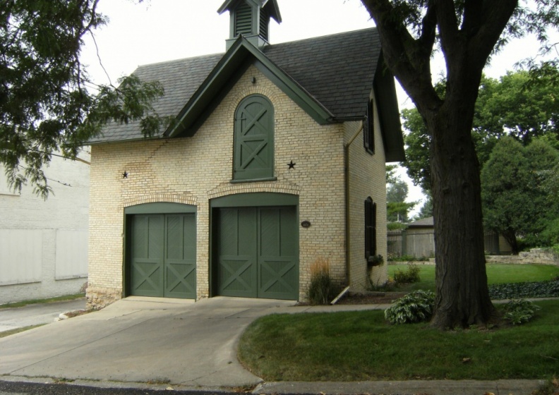 Driving past a victorian carriage house next to the RKFD Brewery in Rockford, Illinois.